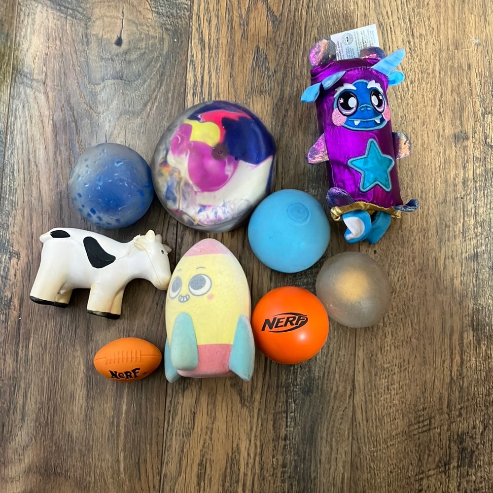 Nine stress balls, fidgets in good shape. One of them is reversible.